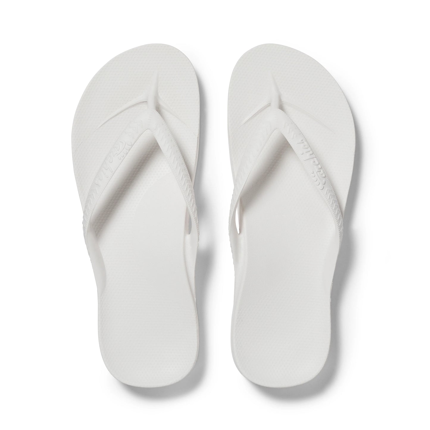 White best sale flip flops